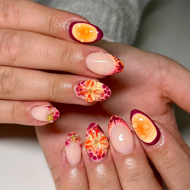 Gelénegler i burgunder og oransje med blomstermotiv og duggdråper